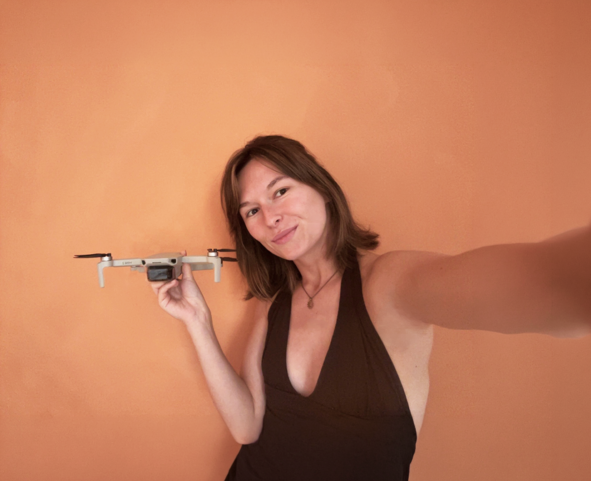 Eva holding a drone in her Barcelona studio