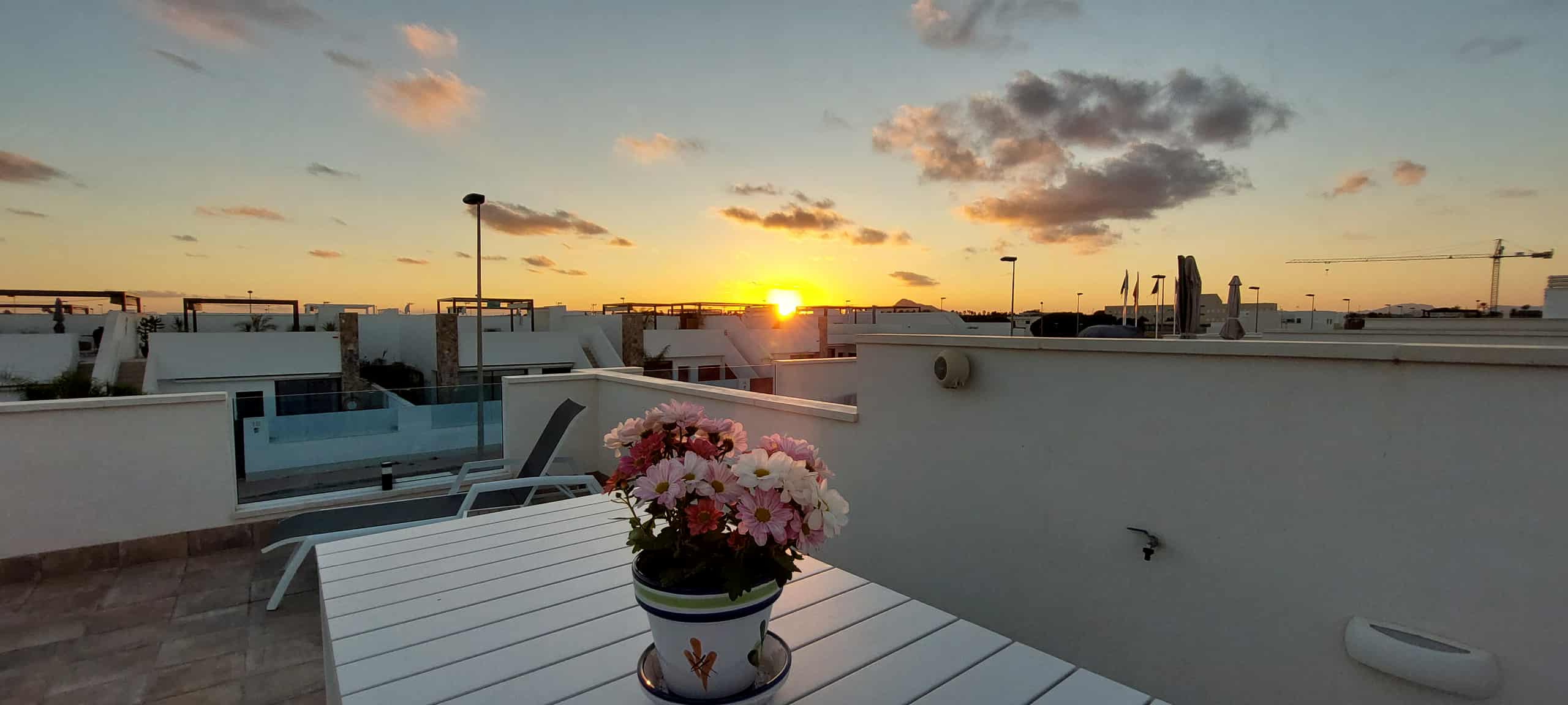 Casa Larylen rooftop at sunset